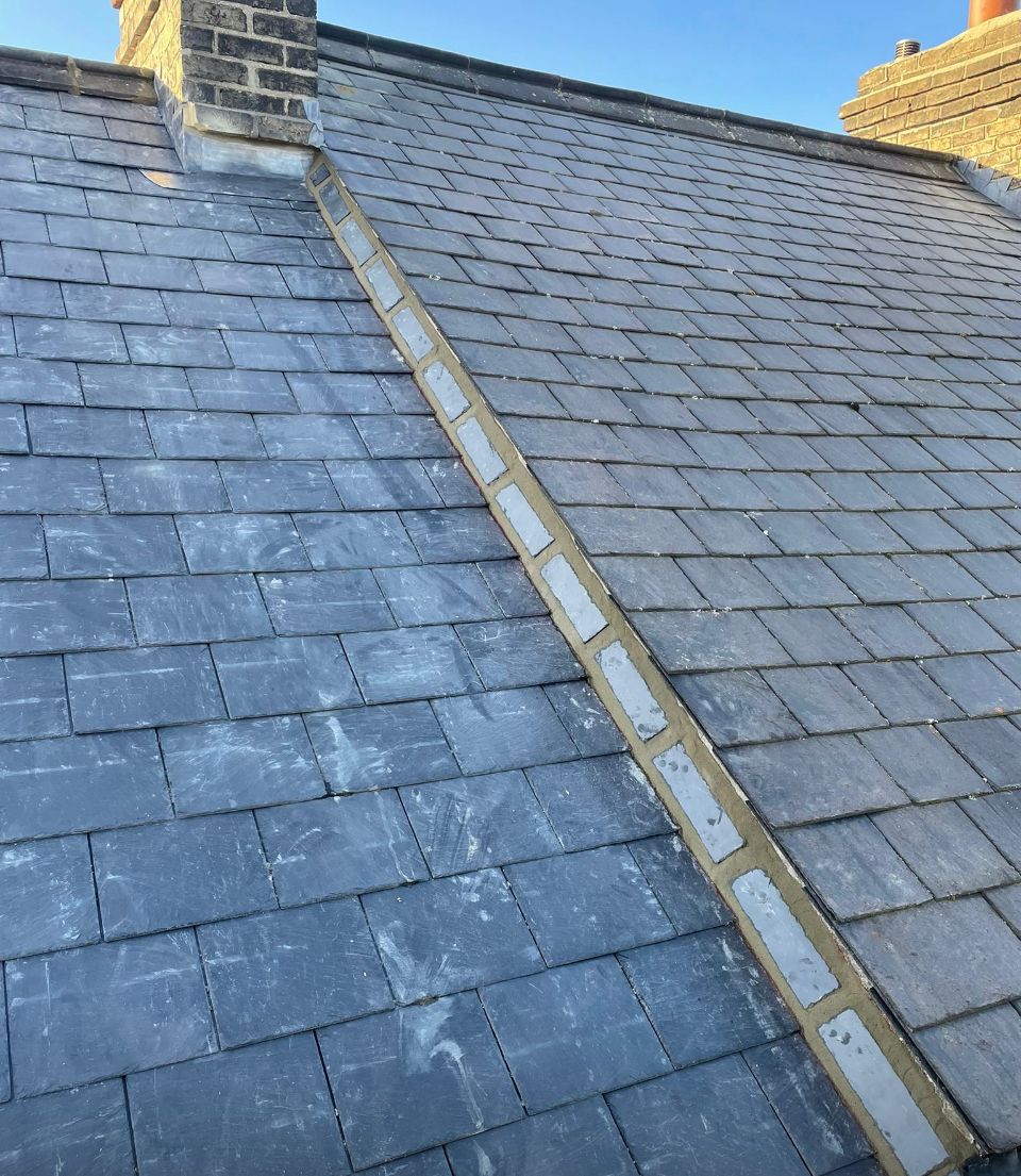 Spanish slate re-roof in Cambridge
